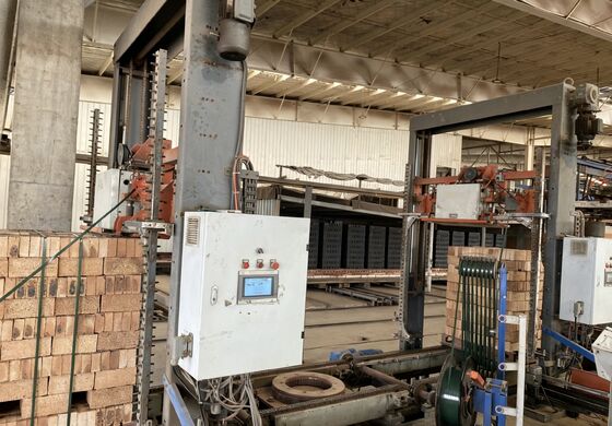 Sistema di scarico e imballaggio di mattoni senza pallet completamente automatico per linee di produzione di mattoni in argilla